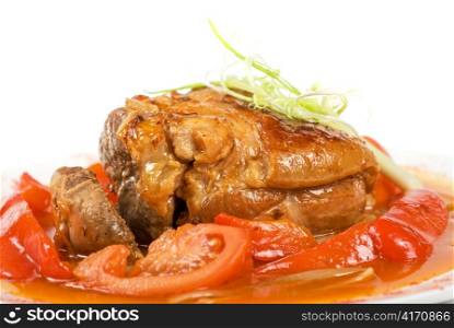 knuckle of veal baked with vegetables closeup