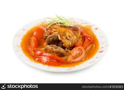 knuckle of veal with vegetables isolated on a white