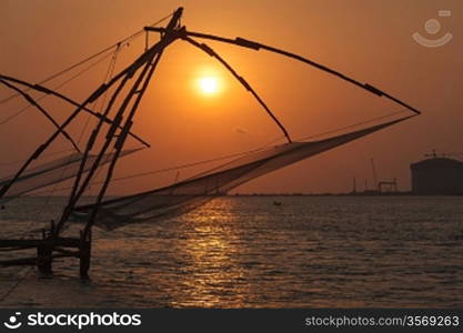 Kochi chinese fishnets on sunset. Fort Kochin, Kochi, Kerala, India