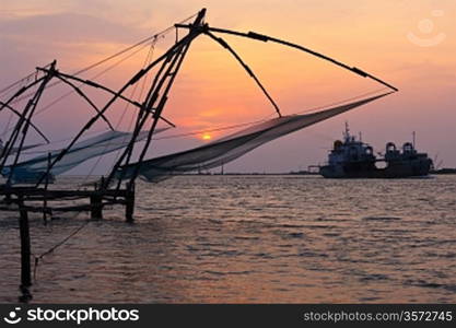 Kochi chinese fishnets on sunset. Fort Kochin, Kochi, Kerala, India