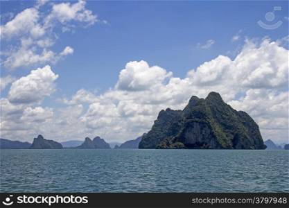 Koh Phanak with other islands in the background in Phang Nga Bay, Thailand