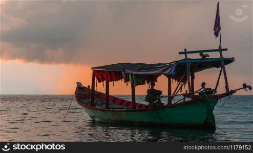Koh Rong Colors at sunset. Koh Rong Island, Cambodia at Sunrise. strong vibrant Colors, Boats and Ocean