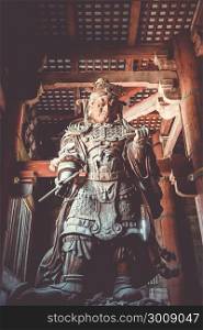 Komokuten guardian statue in Daibutsu-den Todai-ji temple, Nara, Japan. Komokuten statue in Daibutsu-den Todai-ji temple, Nara, Japan