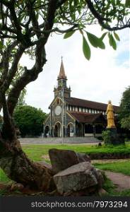 KON TUM, VIET NAM- AUG 22: Kontum wooden church, 100 years old, an ancient cathedral, religion heritage, famous place for travel, amazing architect make wonderful landscape, Vietnam, Aug 22, 2015