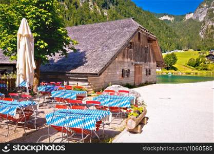 Konigssee coast Bavarian Alpine landscape and old wooden architecture view, Berchtesgadener Land, Bavaria, Germany