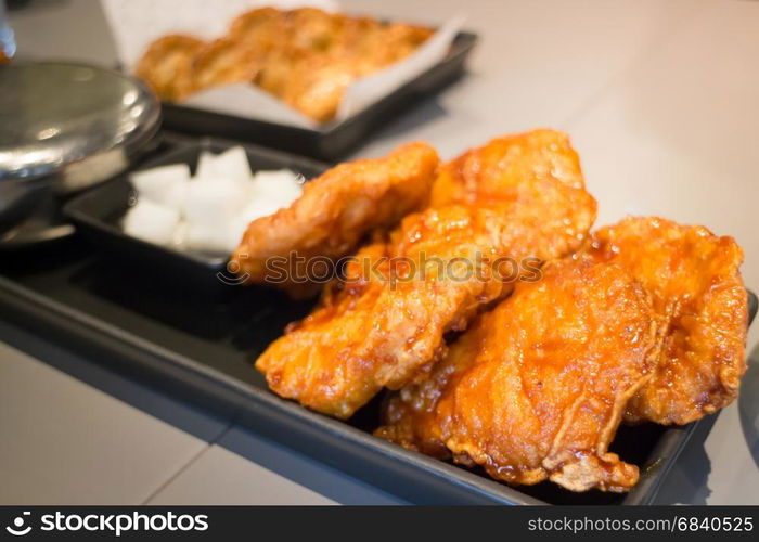 Korean Fried Chicken On Black Plate, stock photo