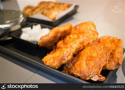 Korean Fried Chicken On Black Plate, stock photo
