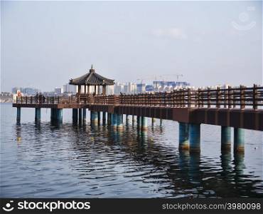 Korean traditional pavilion on the big pier. Sokcho city, South Korea