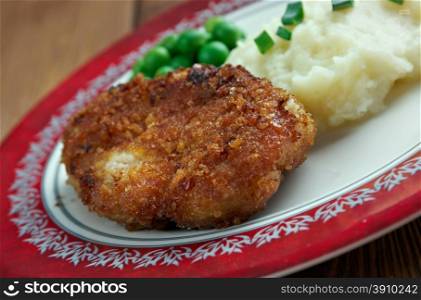 Kotlet schabowy - Polish variety of pork breaded cutlet coated with breadcrumbs similar to Viennese schnitzel,[