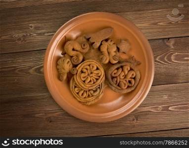 kozuli - Russian Christmas gingerbread over wooden background close up.traditional pagan rite Pomeranian
