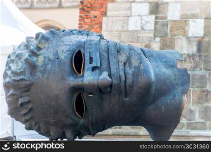 "Krakow, Poland - August 11, 2017: Sculpture by Igor Mitoraj "Ero. Igor Mitoraj&rsquo;s sculpture, Eros Bendato (Eros Tied) (bronze), 1999"