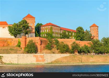 Krakow, Poland - August 11, 2017: Wawel Castle on the banks of t. Wawel Castle is located on a hill at an altitude of 228 meters on the bank of the Vistula River in Krakow. From the 11th to the beginning of the 17th century, the Wawel Castle was the residence of Polish kings and was the center of the country&rsquo;s spiritual and political power.