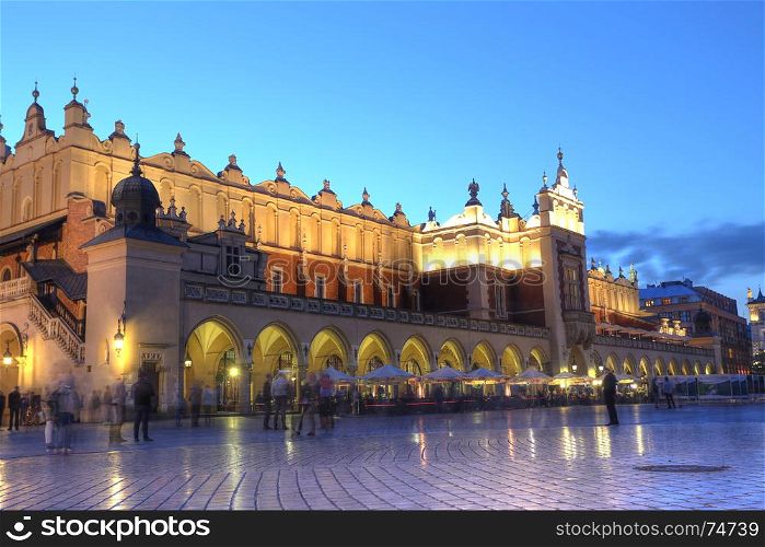 KRAKOW, POLAND, JUL 4: Sukiennice - The Cloth Hall in the sunset in Market Square in Poland is one of the city's most recognizable icons in Krakow, Poland on July 4, 2017.