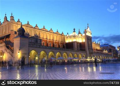 KRAKOW, POLAND, JUL 4: Sukiennice - The Cloth Hall in the sunset in Market Square in Poland is one of the city's most recognizable icons in Krakow, Poland on July 4, 2017.