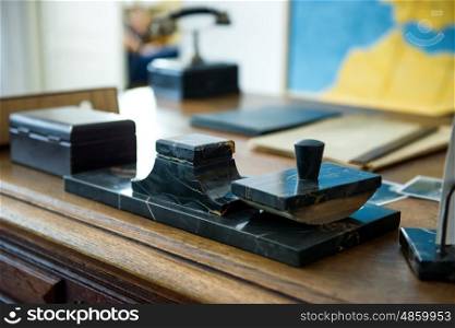 KRAKOW, POLAND- June 4, 2014. Oscar Schindler's cabinet with his own stuff and stationary on the desk in museum factory in Krakow, Poland