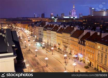 Krakowskie Przedmiescie street at night, part of the Royal Route in the city of Warsaw, Poland.