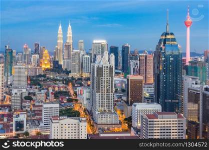Kuala lumpur cityscape. Panoramic view of Kuala Lumpur city skyline during sunrise viewing skyscrapers building and in Malaysia.