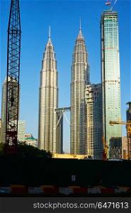 KUALA-LUMPUR, MALAYSIA - Oct 22 2017: Twin towers Petronas and new develop building ,the capital city of Malaysia .