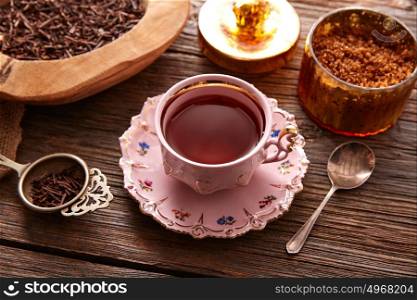 kukicha tea served pink vintage cup on wooden table board