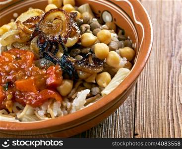 Kushari - is an Egyptian dish of rice, macaroni and lentils mixed together, topped with a tomato-vinegar sauce; some add short pieces of spaghetti garnished with chickpeas and crispy fried onions