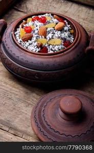 Kutia - traditional Christmas sweet meal.Kutya.Traditional Christmas table.Ukrainian Christmas kutya. Pot with kutia