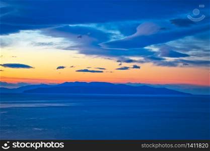 Kvarner bay and island of Krk on open sea at golden dawn view, Adriatic coast of Croatia
