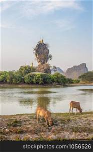 Kyaut Ka Latt Pagoda located in the middle of lake in Hpa-An city in Myanmar