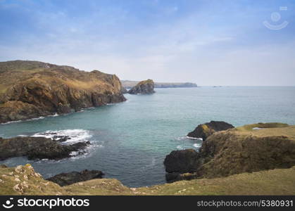 Kynance Cove high tide sunset. Kynance Cove high tide sunset in Cornwall England