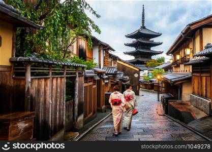 Kyoto, Japan Culture Travel - Asian traveler wearing traditional Japanese kimono walking in Higashiyama district in the old town of Kyoto, Japan.