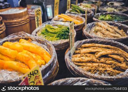Kyoto, Japan - November 09, 2018: Various marinated vegetables at Nishiki market. Japanese preserved vegetable is a traditional dish for Japanese.. Various pickled vegetables at Nishiki market, Kyoto, Japan