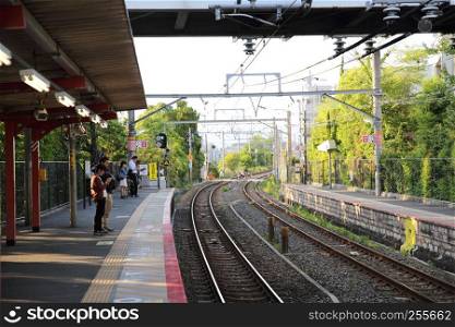 KYOTO - June 2 :railway station with people and town . JAPAN June 2 , 2016