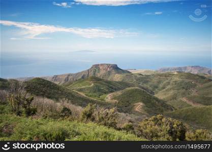 La Gomera landscape viewed from the highest point of the island, El Hierro island is in the background, Canary island, Spain.