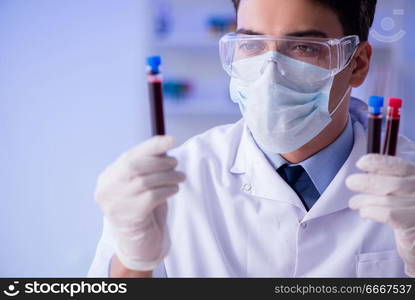 Lab assistant testing blood samples in hospital