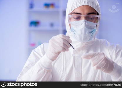 Lab assistant testing blood samples in hospital