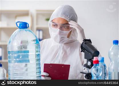 Lab assistant testing water quality