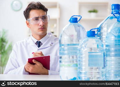 Lab assistant testing water quality