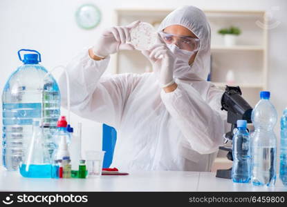 Lab assistant testing water quality