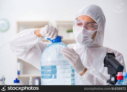 Lab assistant testing water quality