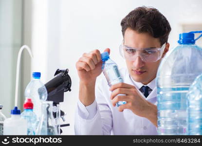 Lab assistant testing water quality