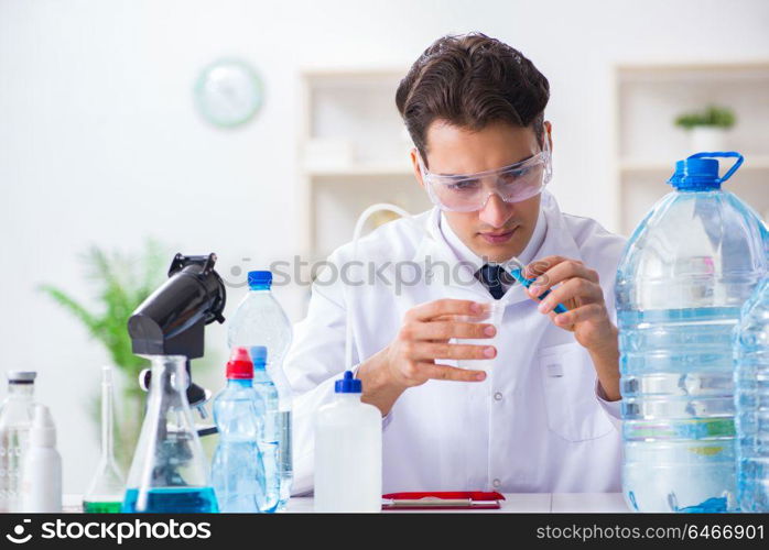 Lab assistant testing water quality