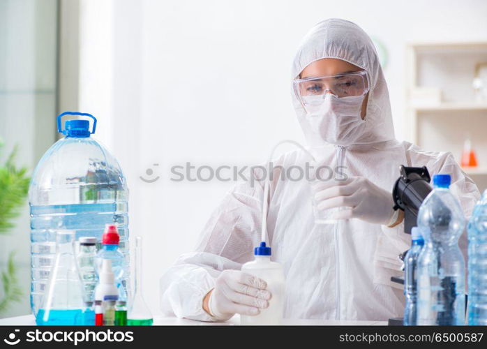 Lab assistant testing water quality