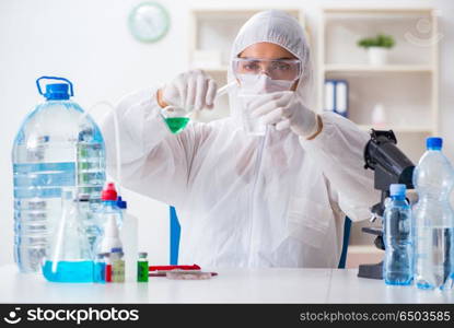 Lab assistant testing water quality