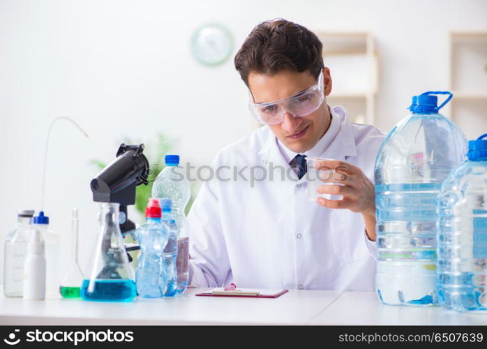 Lab assistant testing water quality