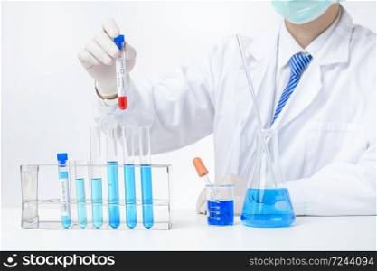laboratory assistant hand is holding blood test infected Covid-19