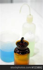 Laboratory stuff, glass cylinder vases, colorful liquids, chemical research