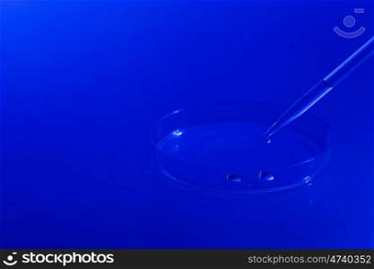 Laboratory test. Image of droplet and glass plate. Microbiological laboratory