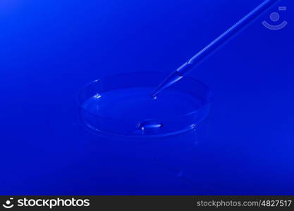 Laboratory test. Image of droplet and glass plate. Microbiological laboratory