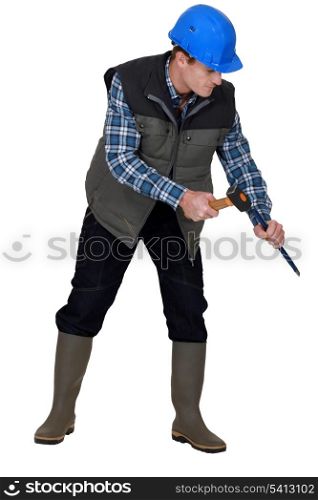 Laborer using hammer on white background