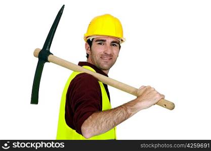 Laborer with pickaxe on his shoulder