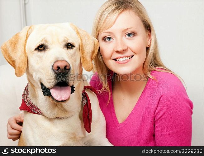 Labrador Retriever and his mom looking into the camera